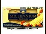 Шоколад Millennium с бесцельным лесным орехом молочный - фото 3